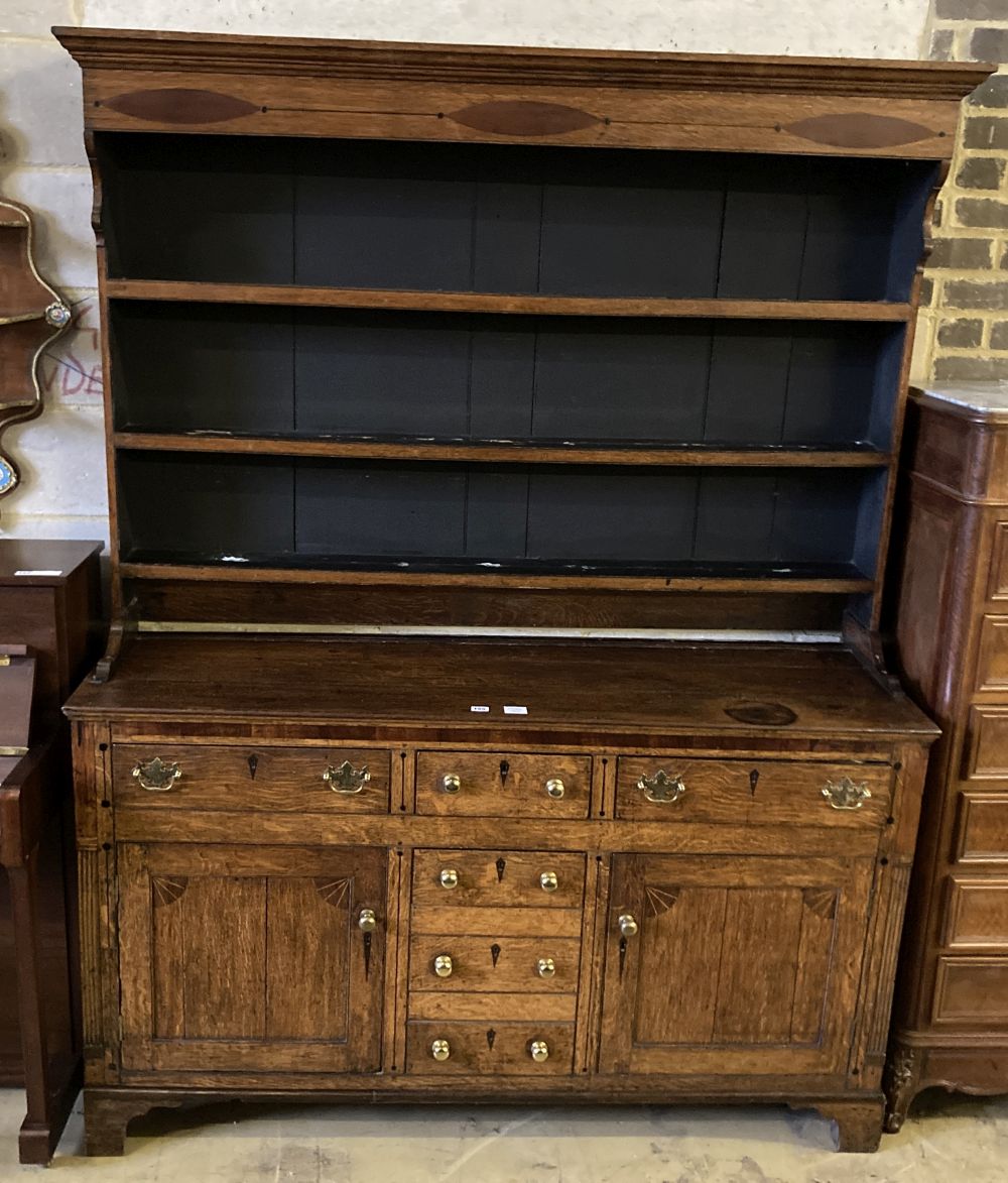 A George III oak dresser, width 155cm, depth 46cm, height 205cm